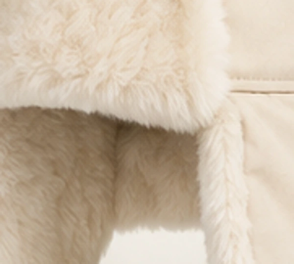 Sneg Classic Ushanka, close-up of Ivory material and trim