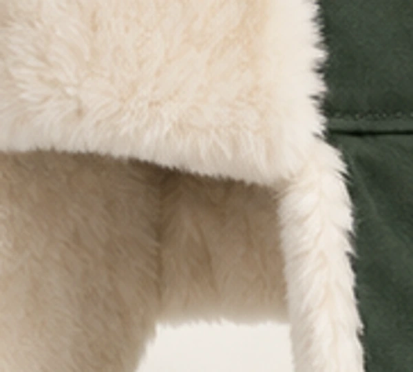 Taiga Classic Ushanka, close-up of Forest Green material and trim
